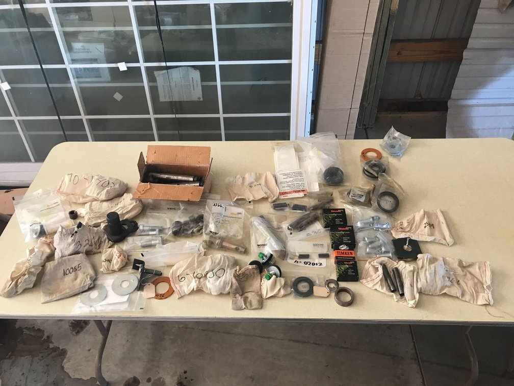 ASSORTMENT OF GENUINE REPLACEMENT PARTS FOR WOODS MOWER