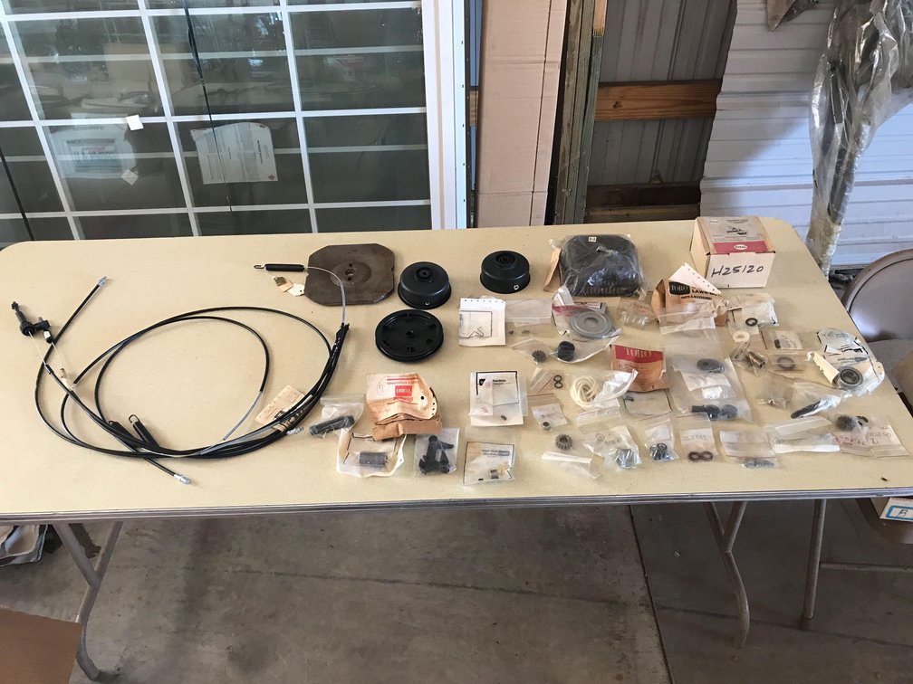 ASSORTMENT OF TORO MOWER PARTS & TOTAL TRIMMER HEAD