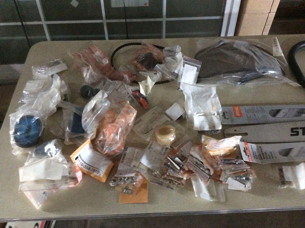 ASSORTMENT OF STIHL CHAIN SAW PARTS,(BARS, CHAINS, HANDLE, & MISC PARTS)