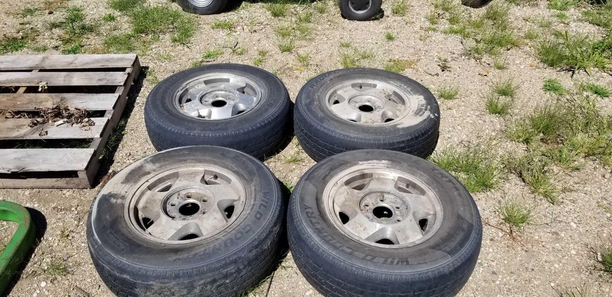 (4) 90S GM ALUM RIMS WITH TIRES 6 BOLT