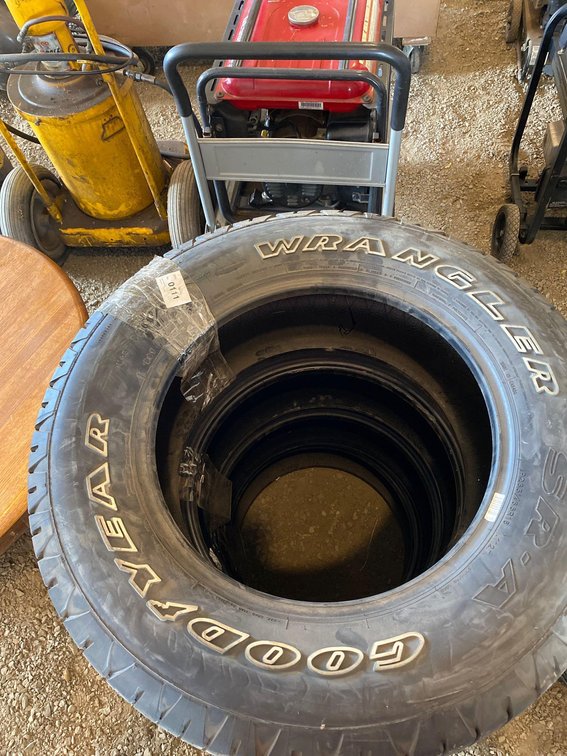 (4) NEW GOODYEAR WRANGLER TIRES (P265/65 R18)