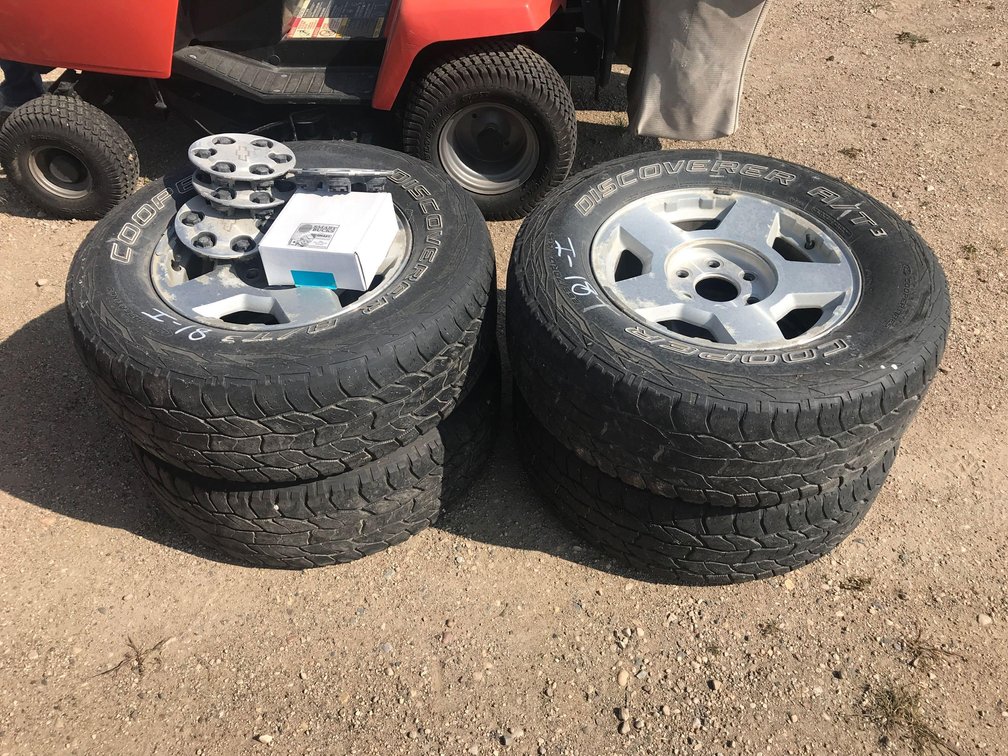 (4) CHEVY ALUM RIMS WITH 265/70R17 TIRES (ITEM AT ZIELSDORF AUCTIONS)
