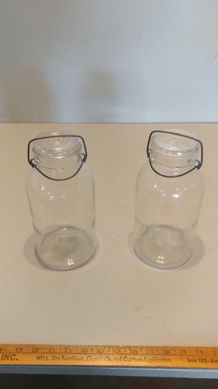 (2) HALF GALLON GLASS JARS WITH GLASS LIDS