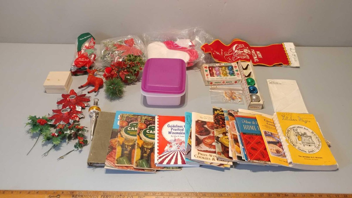 ASSORTMENT OF COOKBOOKS, TUPPERWARE CONTAINER, & CHRISTMAS DECORATIONS