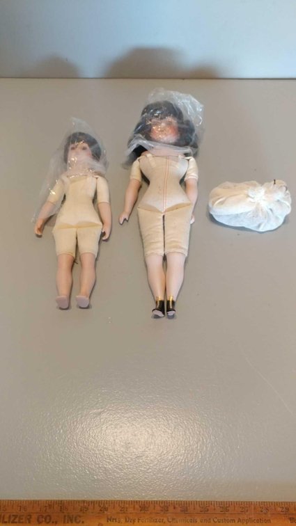 (2) PORCELAIN DOLLS WITH CLOTH BODIES