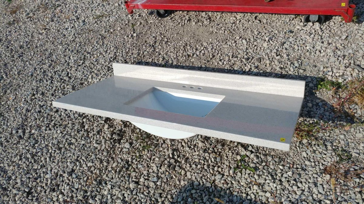 BATHROOM SINK AND COUNTER (49"W X 22"D)