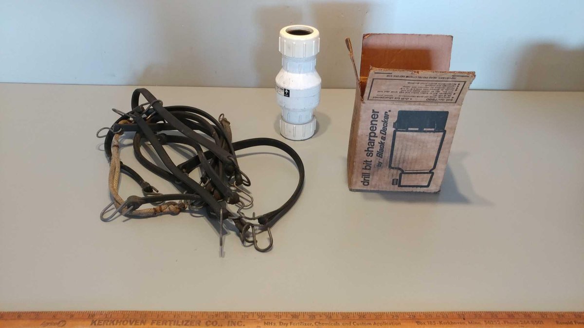 DRILL BIT SHARPENER, PVC CHECK VALVE, & ASSORTMENT OF RUBBER BUNGIE STRAPS