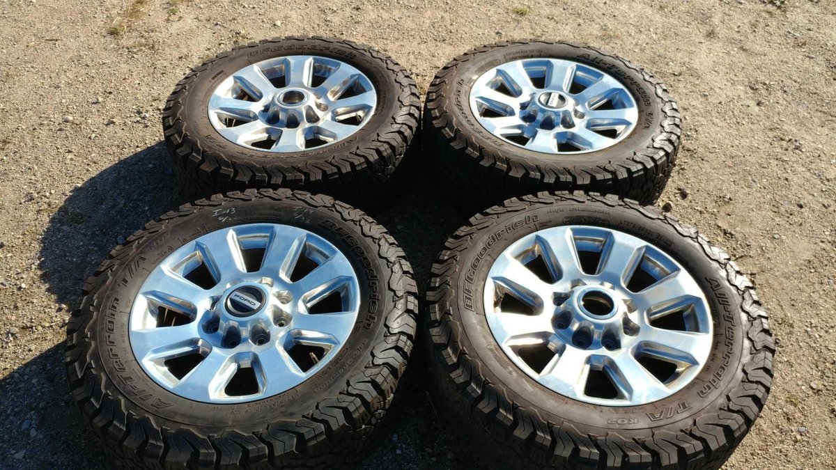(I-13) (4) BFGOODRICH ALL-TERRAIN T/A LT 275/ 65 R20 APPROX. 6/32 TREAD TIRES W/ (4) 20" CHROME RIMS