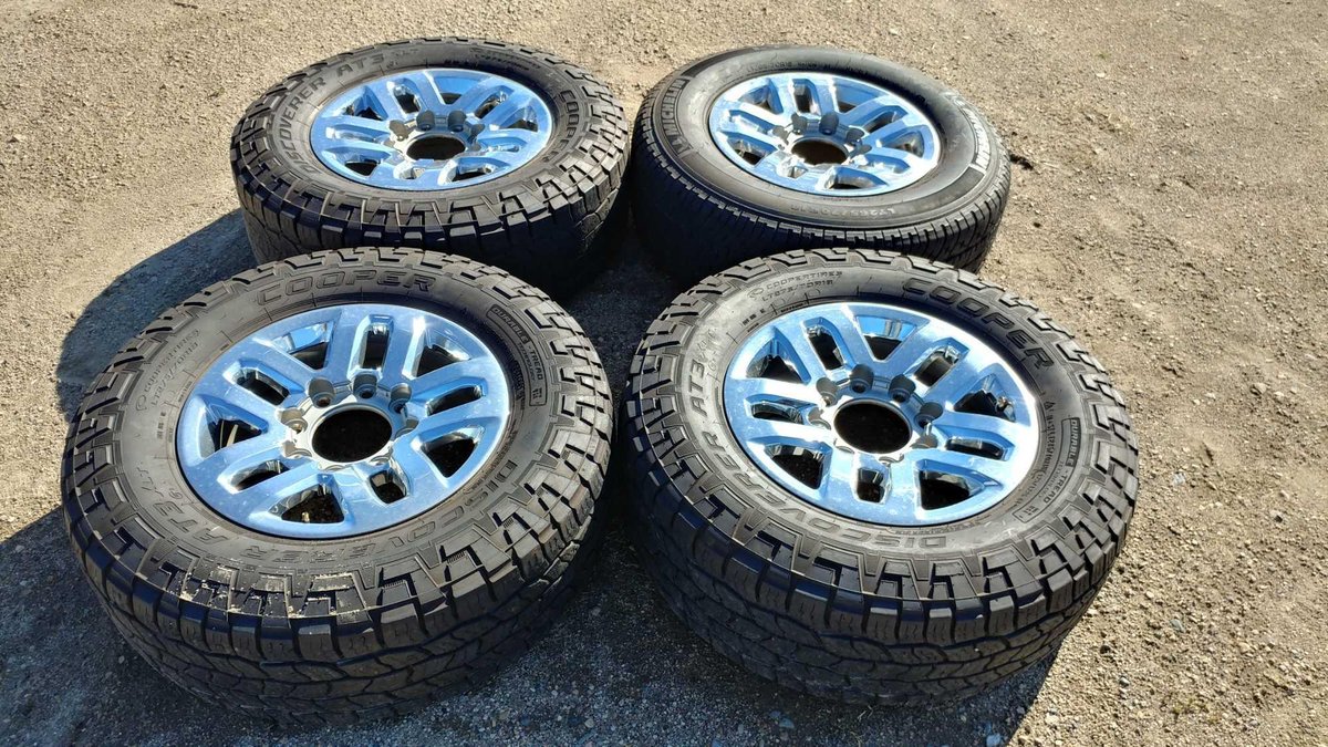 (I-3) (4) COOPER DISCOVER AT3 LT275/70 R18 APPROX. 8/32 TREAD TIRES W/ (4) 18" CHROME RIMS (FITS GM '10 AND UP)