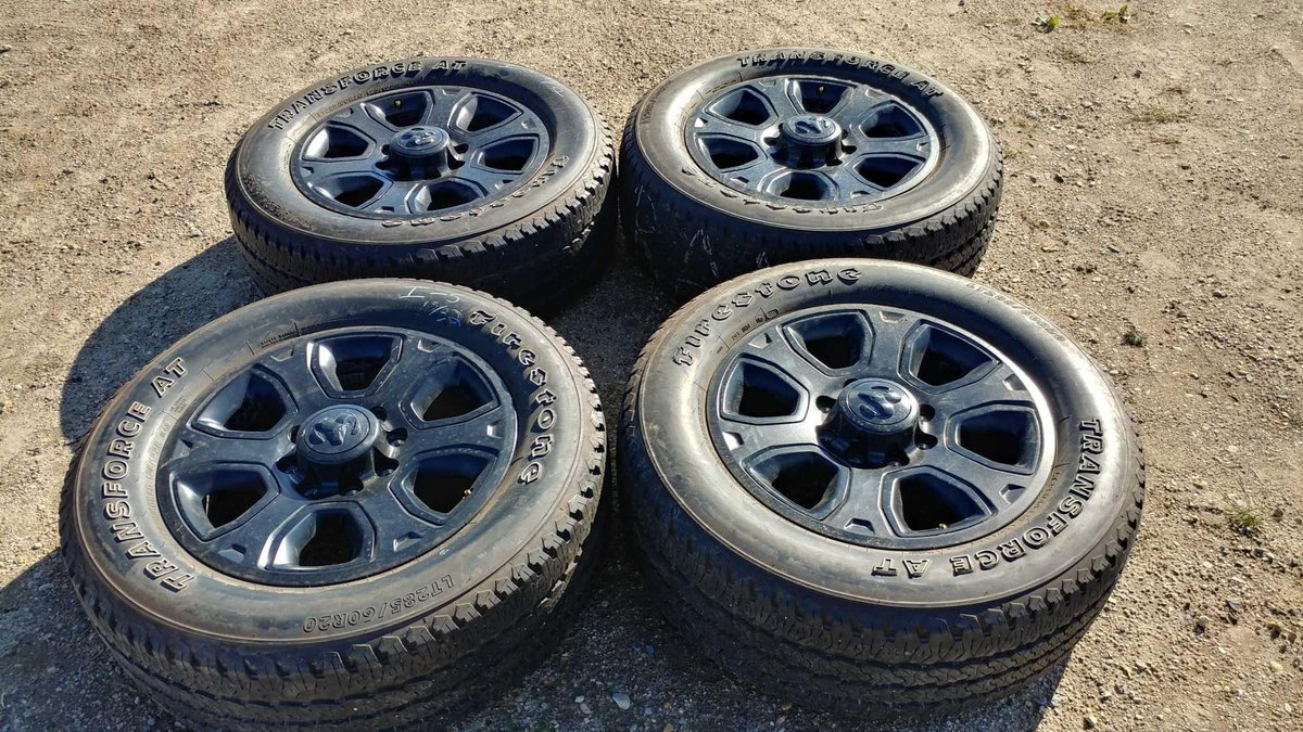 (I-5) (4) FIRESTONE TRANSFORCE AT LT 285/60 R20 APPROX. 13/32 TREAD TIRES W/ 20" ALUMINUM ALLOY RIMS (FITS DODGE 8-BOLT TRUCKS)