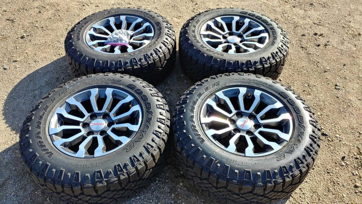 (I-27) (4) GOODYEAR WRANGLER DURATRAC LT275/65 R18 APPROX. 18/32 TREAD TIRES W/ 18" CHROME ALUM GMC RIMS (ALL GM TRUCKS '88 AND UP)