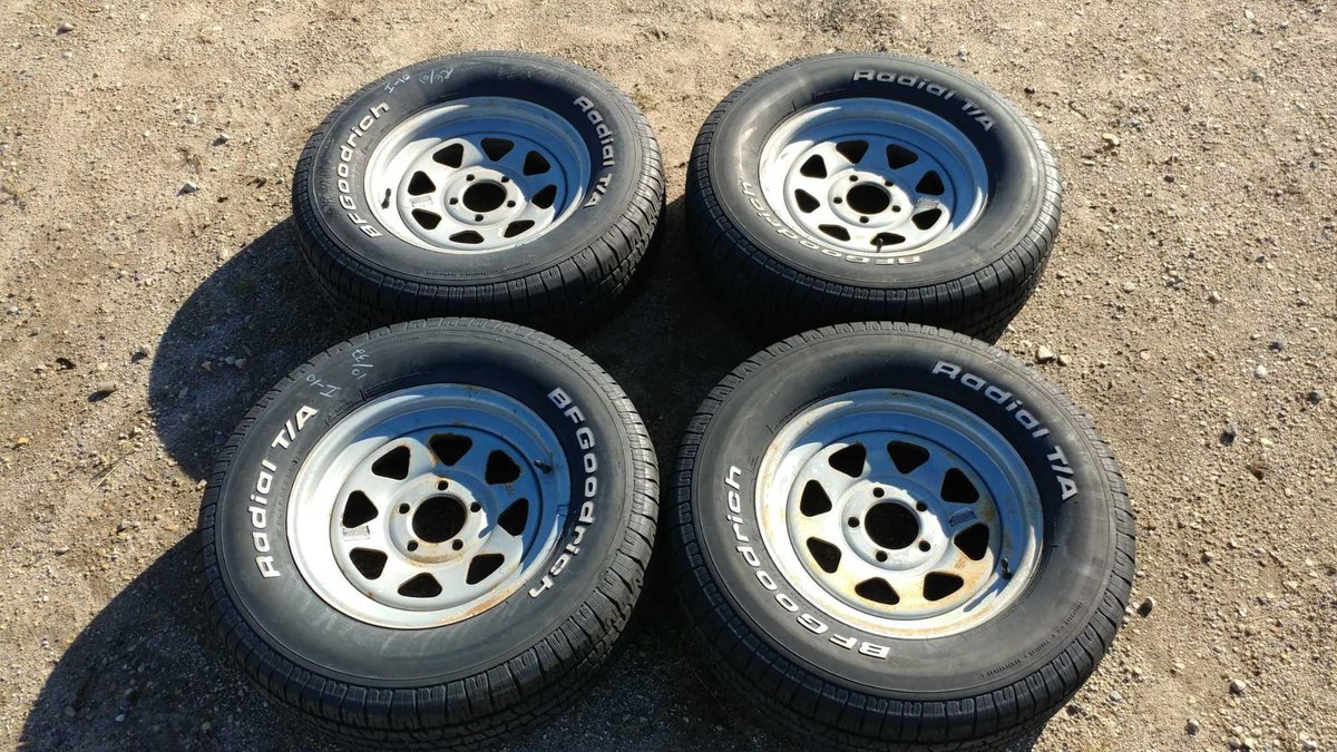 (I-10) (4) BFGOODRICH RADIAL T/A P225/70 R15 APPROX. 10/32 TREAD TIRES W/ (4) 15" STEEL RIMS