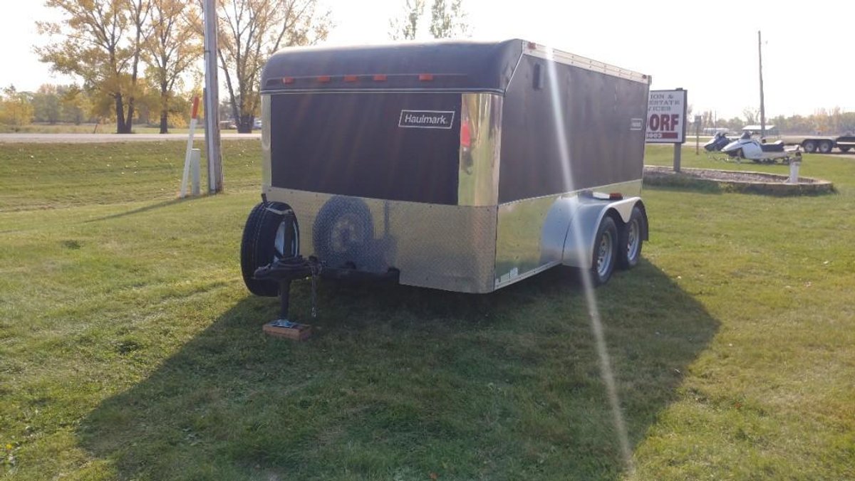 (I-50) (TITLE) HAULMARK 12' INCLOSED DOUBLE AXLE TRAILER, 2 5/16" BALL