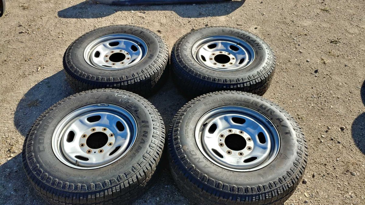 (I-12) (4) NANKAHO CONQUEROR A/T LT 245/75 R17 APPROX. 13/32 TREAD TIRES W/ (4) 17" STEEL RIMS (FITS FORD 250 SUPER DUTY)
