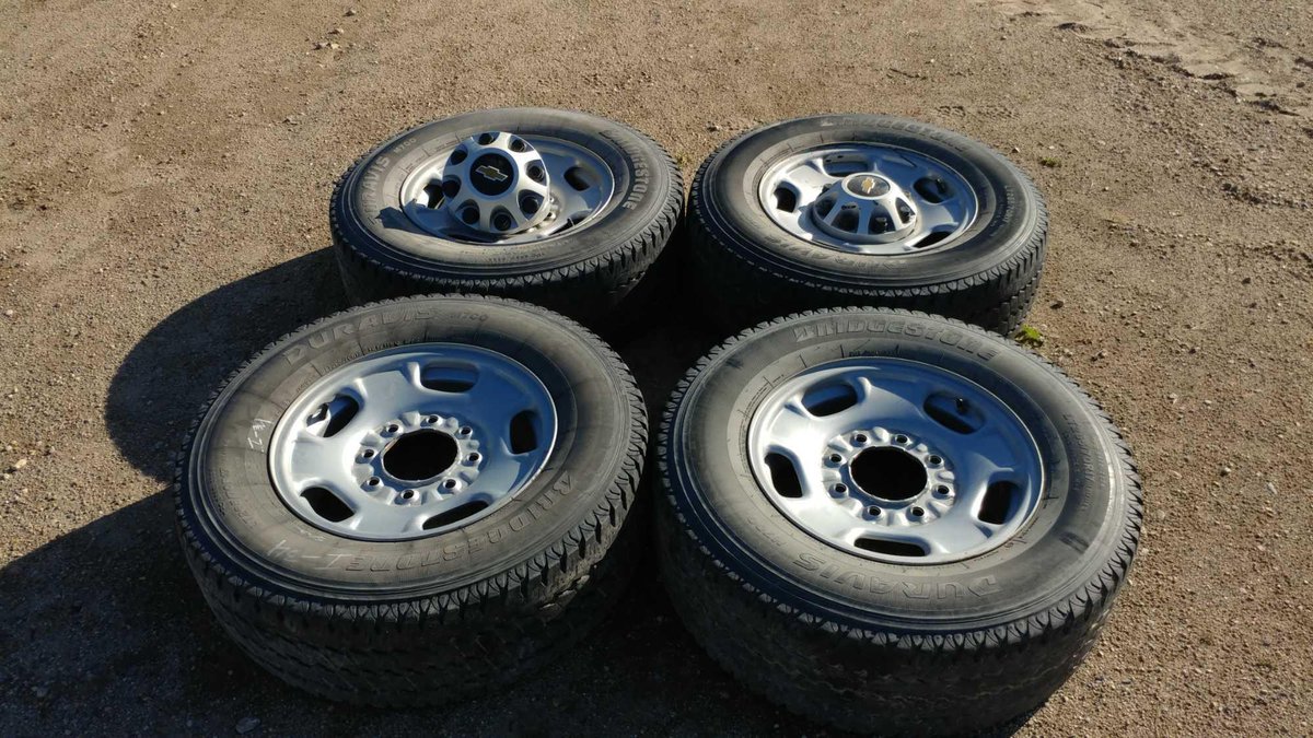 (I-34) DURAVIS BRIDGESTONE LT265/70 R17 APPROX. 5/32 TREAD TIRE W/ 17" STEEL RIM (FITS GM 8-BOLT '10 AND UP)