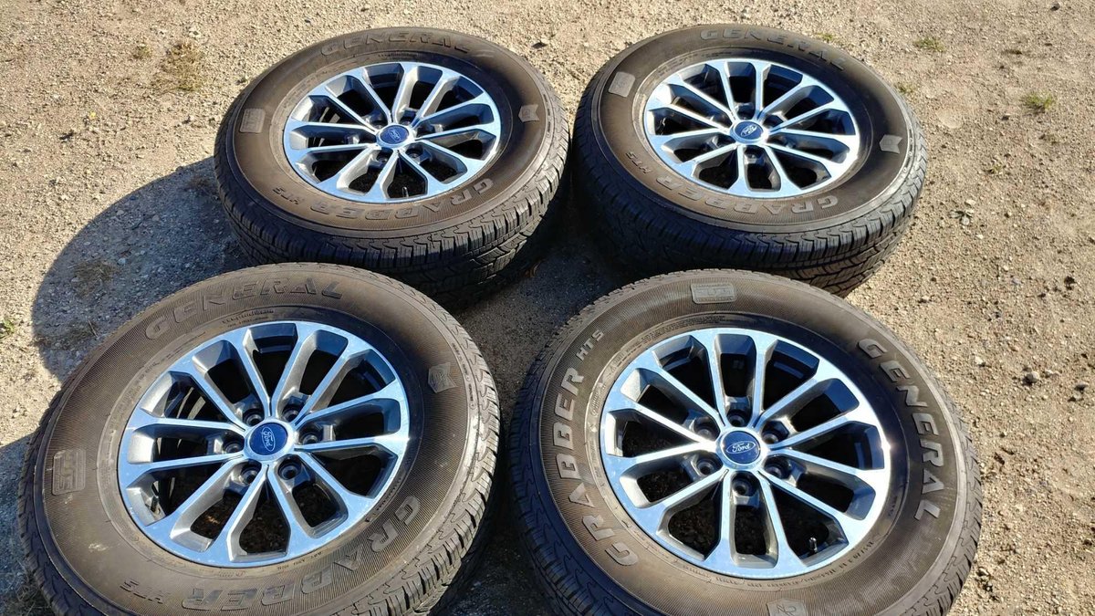 (I-14) (4) GENERAL GRABBER HTS 265/70 R18 APPROX. 9/32 TREAD TIRES W/ (4) 18" FORD CHROME RIMS