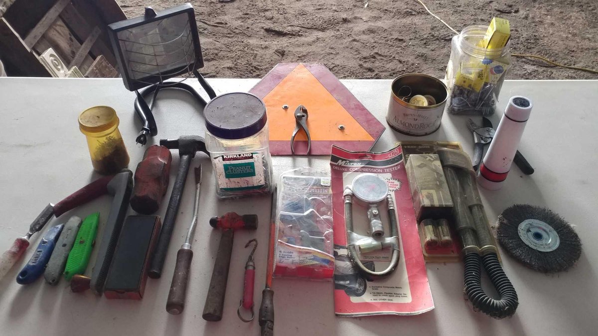 HALOGEN LIGHT, SLOW VEHICLE SIGN, SNAKE LIGHT, COMPRESSION TESTER, HAMMERS, FUSES, AND MISC