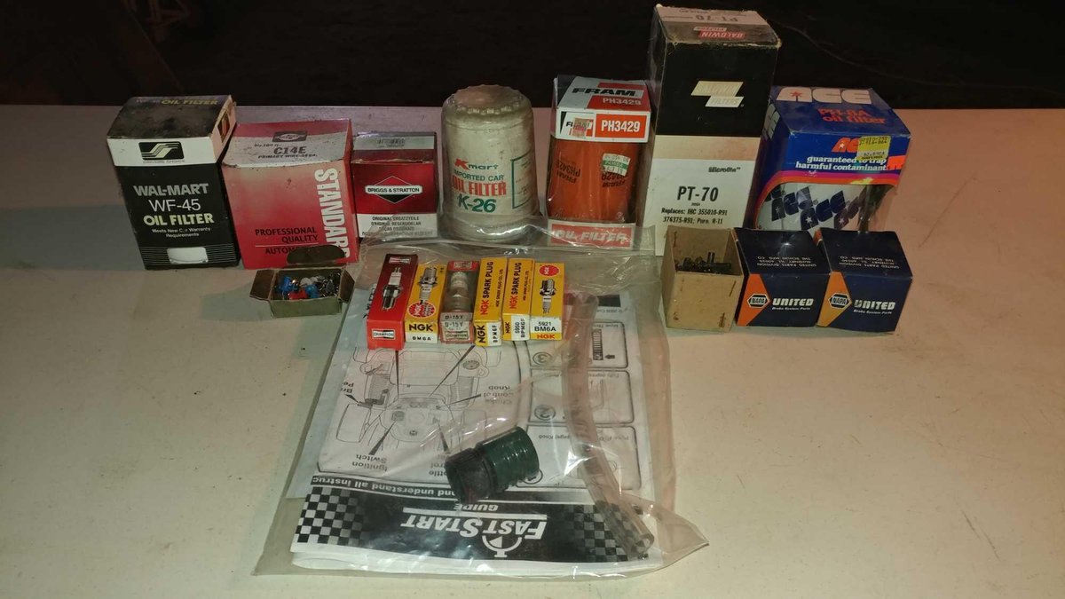 ASSORTMENT OF OIL FILTERS AND SPARK PLUGS