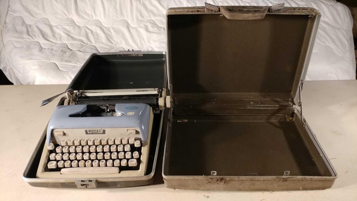 ROYAL TYPEWRITER AND VINTAGE SUITCASE