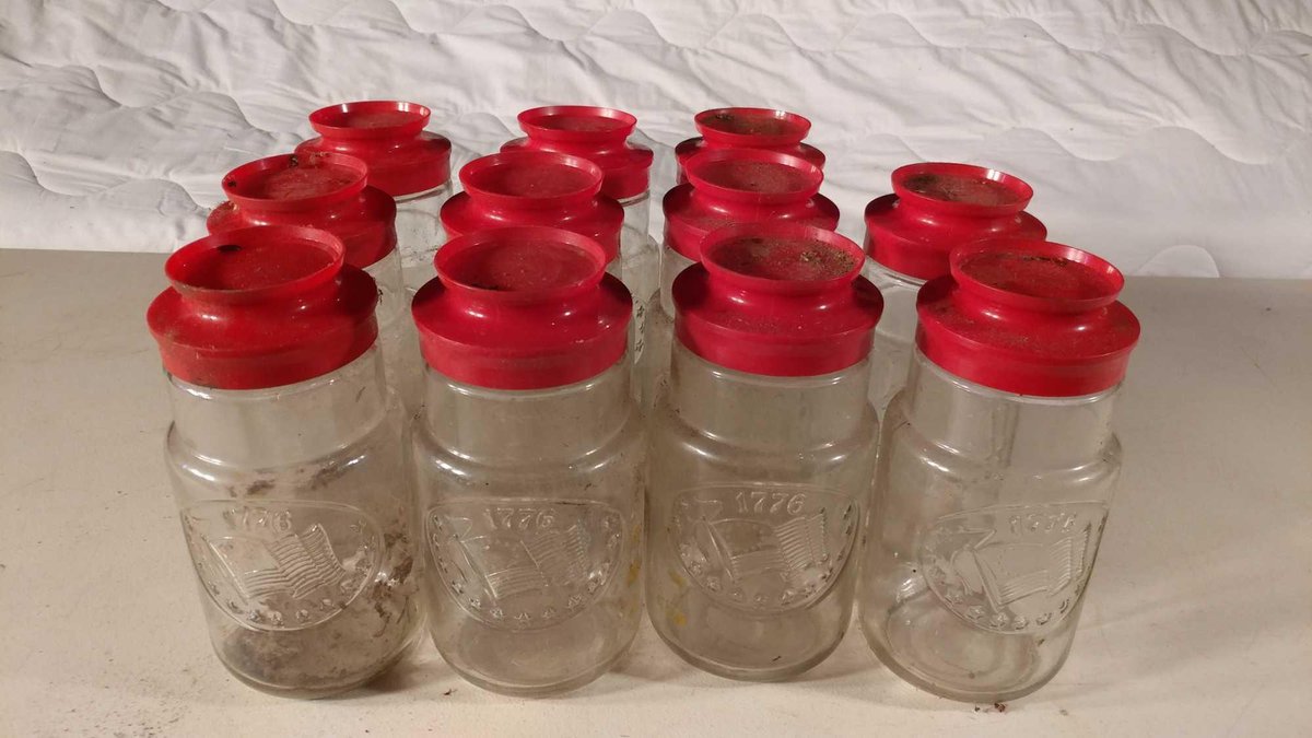 ASSORTMENT OF VINTAGE MASON JARS