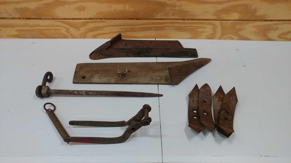 (2) PLOW SHARES, CULTIVATOR SHOES, AND MISC