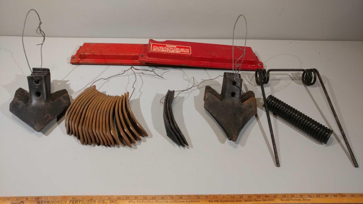 (I-18) ASSORTMENT OF SHOVELS, CHISELS, SPRING, HARROW TINE, AND IMPLEMENT COVERS (LOCATED AT ZIELSDO