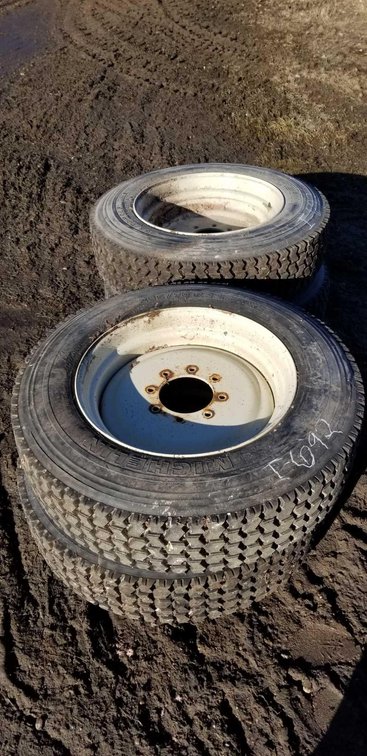 (I-692) (4) 255/70R22.5 MICHELIN SKID STEER SNOW TIRES ON HD 8 BOLT RIMS (LOCATED AT ZIELSDORF AUCTI