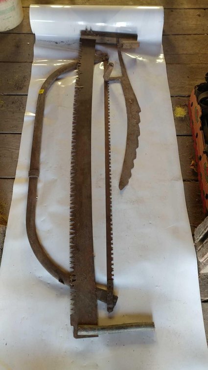 (A) 2-MAN SAW, LARGE BOW SAW, AND HAY SCYTHE 