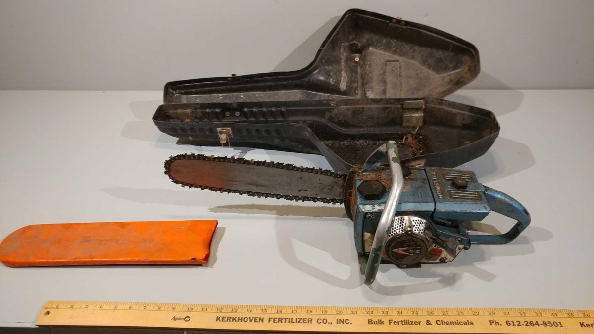 HOMELITE GAS CHAINSAW W/CASE (UNKNOWN CONDITION, NOT STUCK)