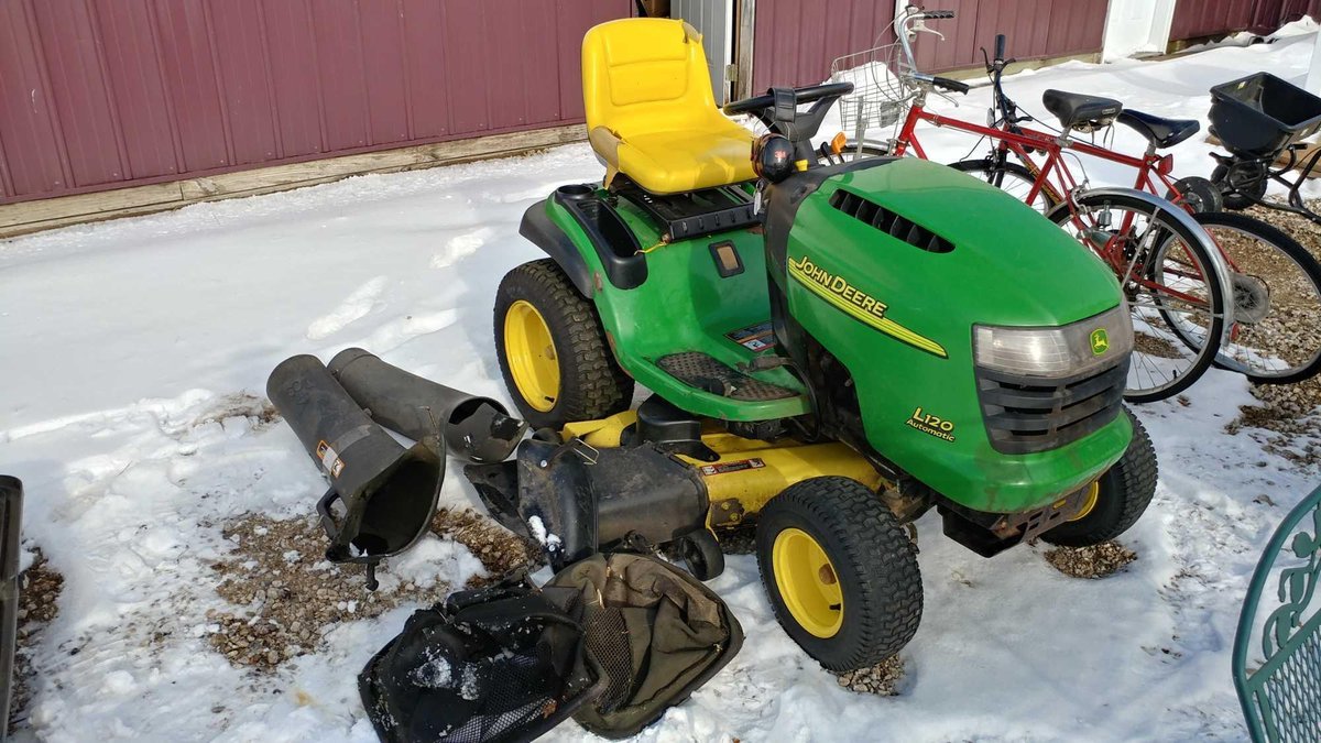 JOHN DEERE L120 AUTOMATIC RIDING LAWN MOWER, 717 HRS, 48" DECK, 22 HP V-TWIN ENGINE, AND BAGGER SYST