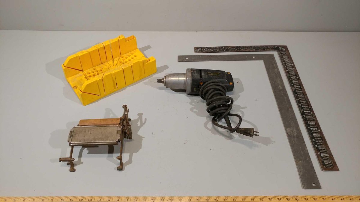 ELECTRIC 1/2" IMPACT WRENCH, MITRE BOX, (2) SQUARES, AND ANTIQUE ROLLER DEVICE