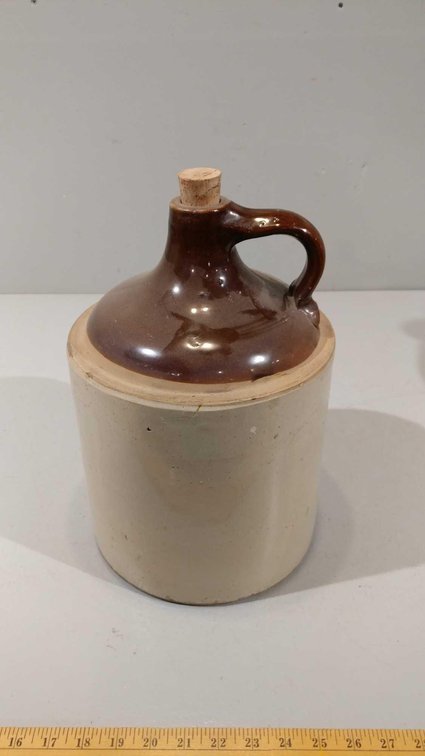 BIG STONEWARE JUG W/CORK, (SOME CHIPS)