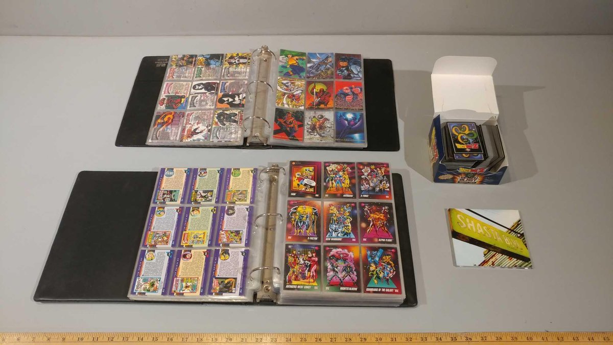 (2) BINDERS OF MARVEL UNIVERSE & DRAGON BALL Z TRADING CARDS