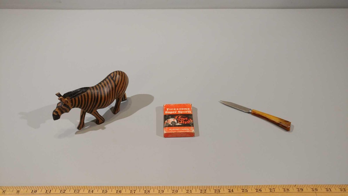 VINTAGE FIRESTONE SUPER SPORTS PLAYING CARDS, WOOD CARVED ZEBRA, AND PARING KNIFE W/NORTHWESTERN STA