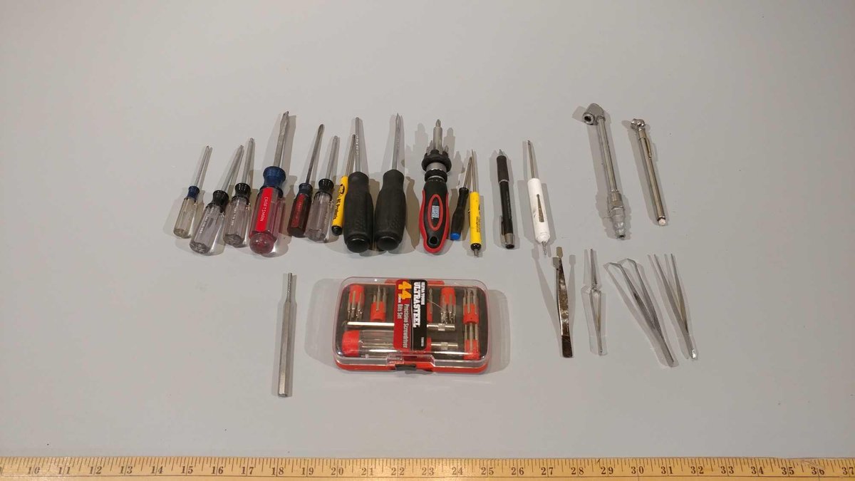 ASSORTMENT OF SCREWDRIVERS, TWEEZERS, TIRE GAUGE, AND MISC