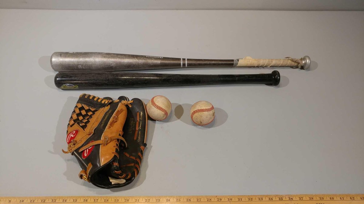 (2) BASEBALL BATS, BASEBALLS, AND LEFT HANDED BASEBALL GLOVE