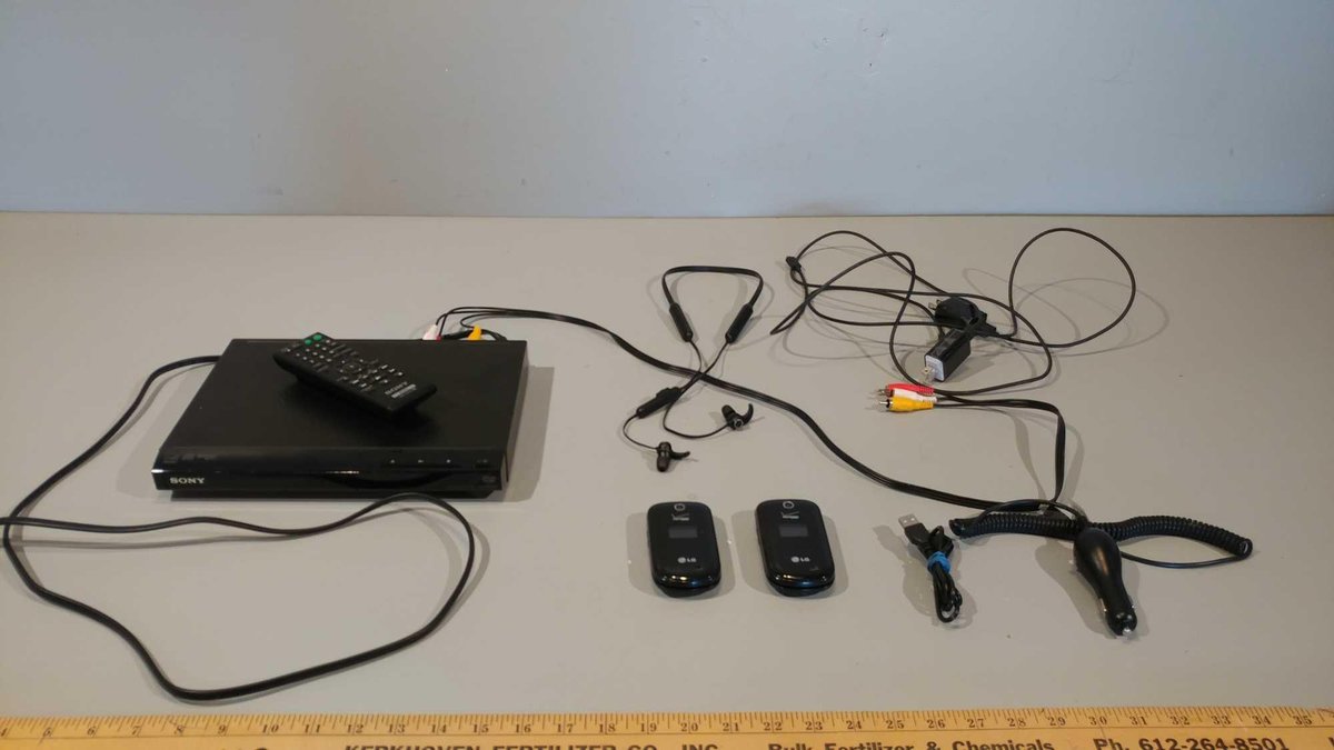 SONY CD/DVD PLAYER, (2) LG FLIP PHONES, CAR CORD, & WIRELESS AROUND THE NECK BLUETOOTH STEREO EARBUD