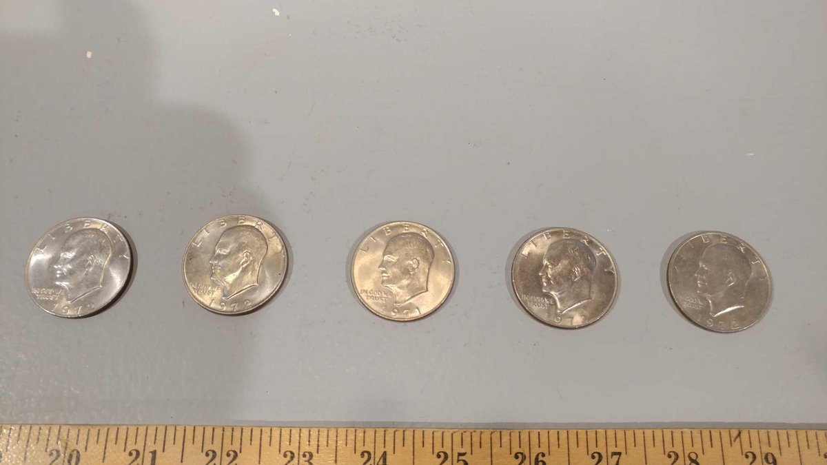 VINTAGE (4) LIBERTY SILVER DOLLARS 1972, AND (1) LIBERTY SILVER DOLLARS 1971