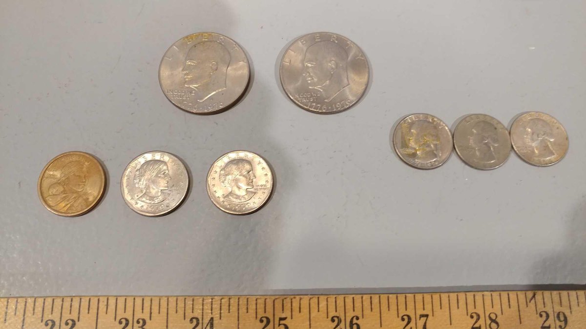 (2) COLLECTOR LIBERTY SILVER DOLLARS 1776-1976, (2) LIBERTY SILVER DOLLARS 1979, (2) QUARTERS 1964 &