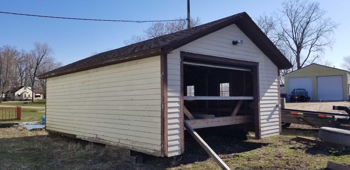 (I-450) 16' W X 24' W GARAGE TO BE MOVED WOOD SIDING, 10'WX7'T OVERHEAD DOOR WITH XTREAM DOOR OPENER