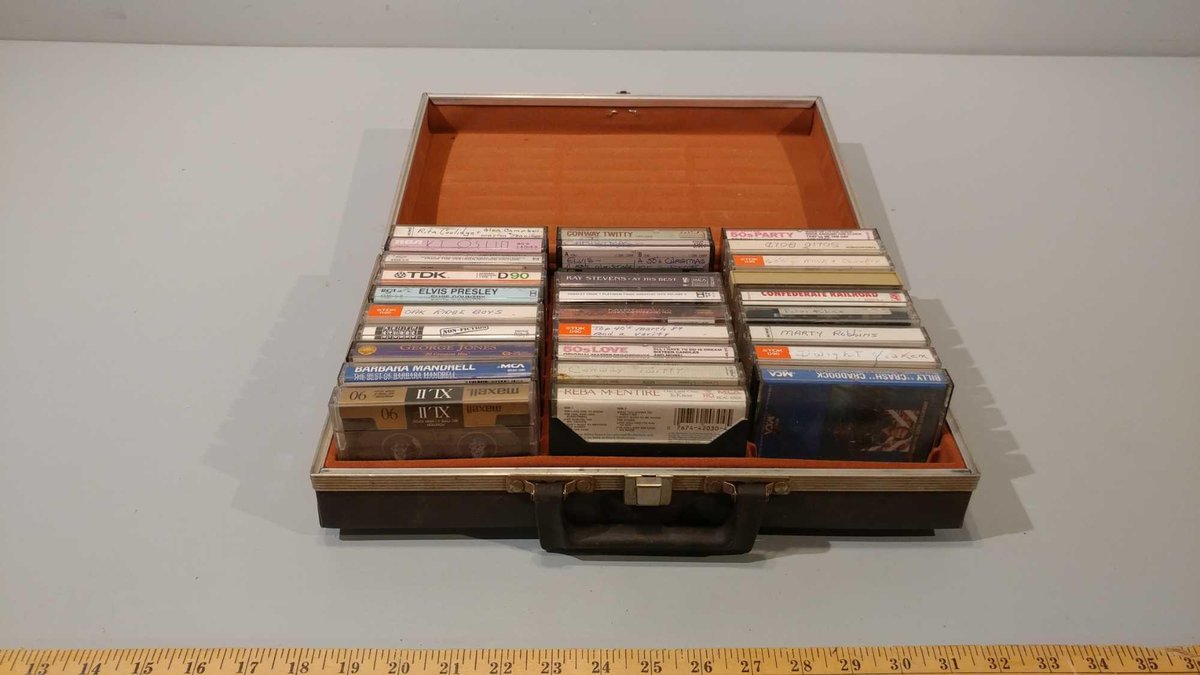 ASSORTMENT OF CASSETTE TAPES WITH CASE