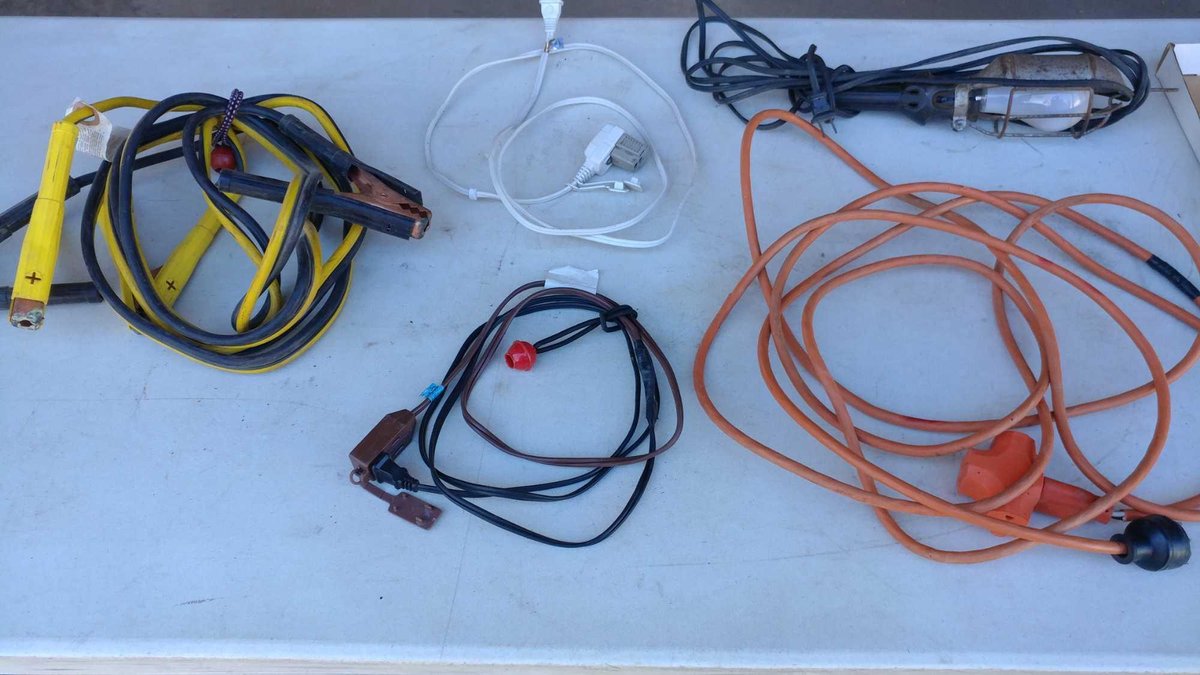EXTENSION CORDS, TROUBLE LIGHT, AND JUMPER CABLES