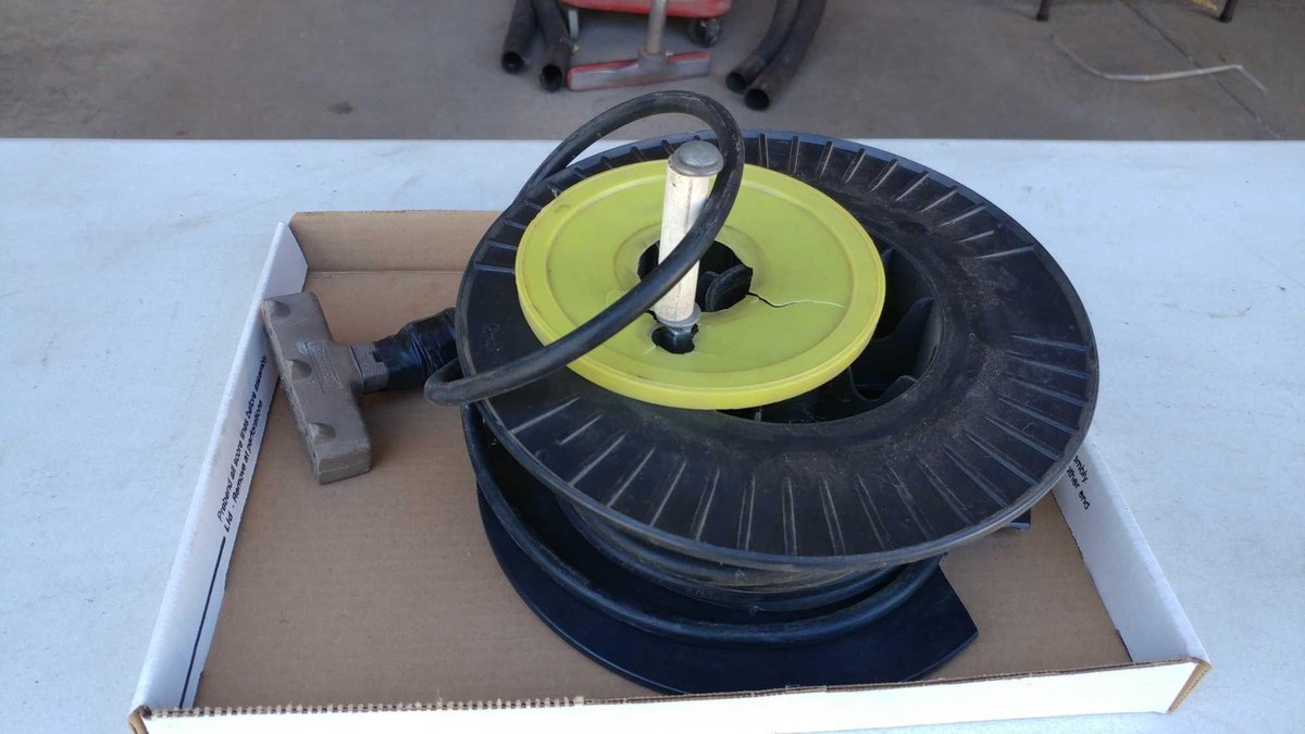 EXTENSION CORD ON CORD WHEEL