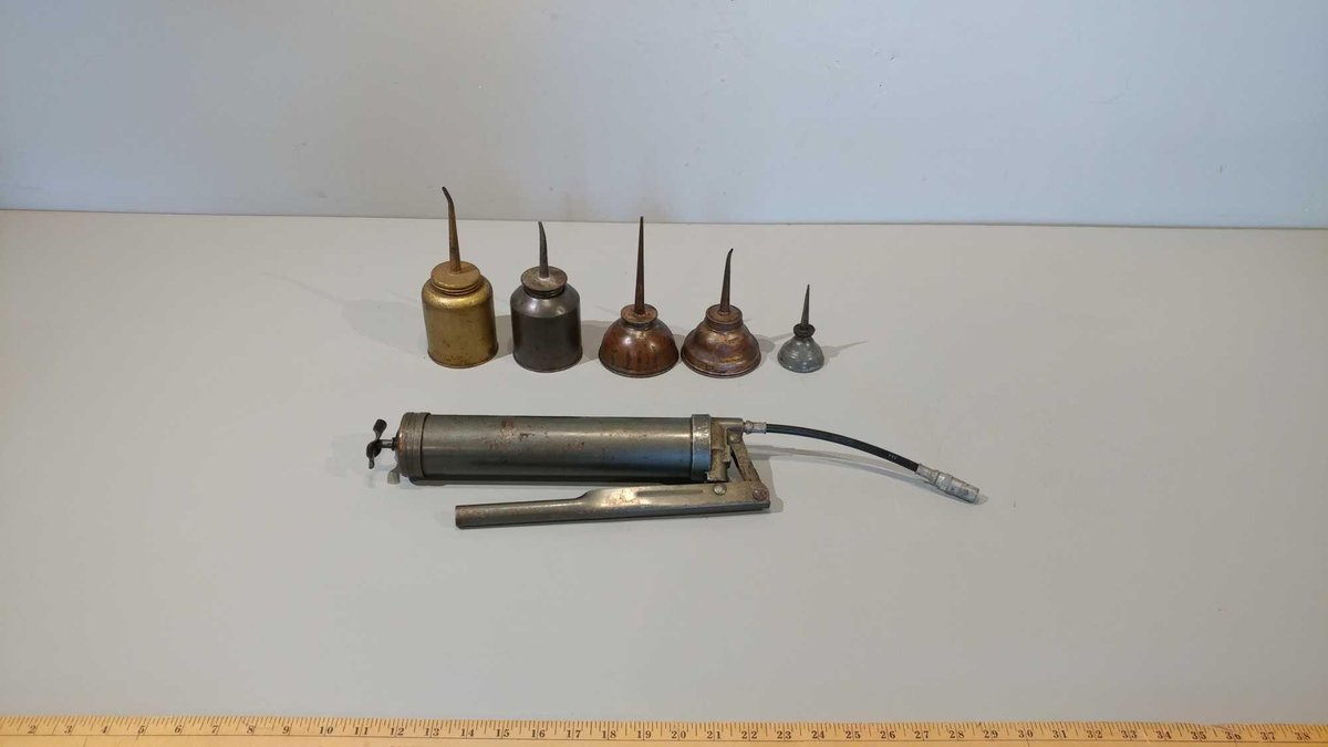 (5) VINTAGE OILER CANS AND GREASE GUN