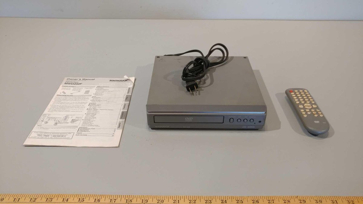 DVD PLAYER WITH REMOTE TESTED AND WORKS