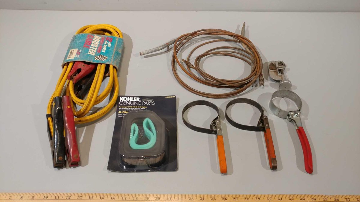 JUMPER CABLES, AIR FILTER, (3) OIL FILTER WRENCHES, DRAIN SNAKE, PIPE CUTTER