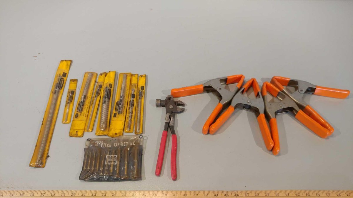 ASSORTMENT OF MASONRY DRILL BITS, 10 PIECE TAP SET, RUBBER TIPPED CLAMPS, AND A MULTI-TOOL