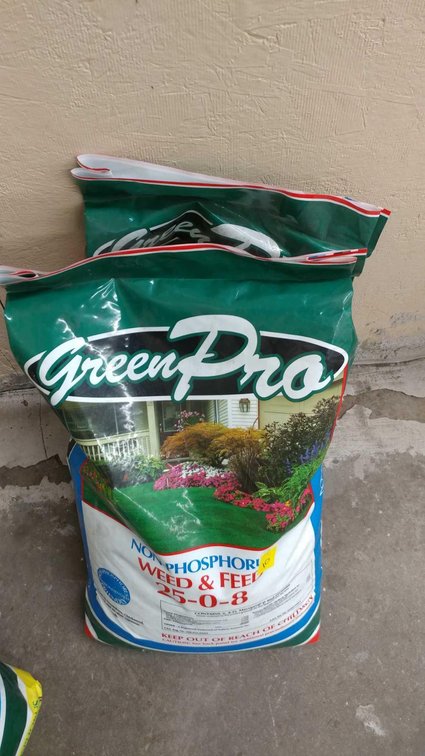 (2) GREEN PRO 18 LB BAGS OF WEED AND FEED