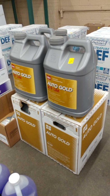(7) 2.5 GAL CONTAINER & (9) QUARTS OF AUTO GOLD ATF DM AUTO TRANS FLUID