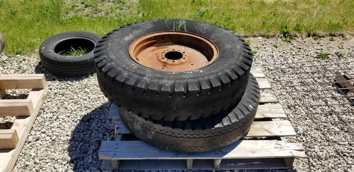 (I-68) (2) 9.00-20 TIRES ON 6 BOLT RIMS 
